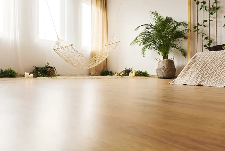 Bedroom with light hardwood flooring