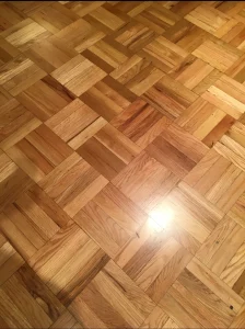 Close-up of a finger-block basket-weave parquet hardwood floor installed by AG Floor Covering