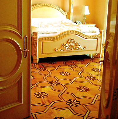 Luxury bedroom with mosaic flooring